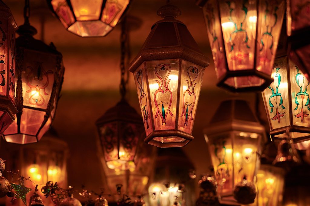 Colourful traditional lanterns glowing warmly at night